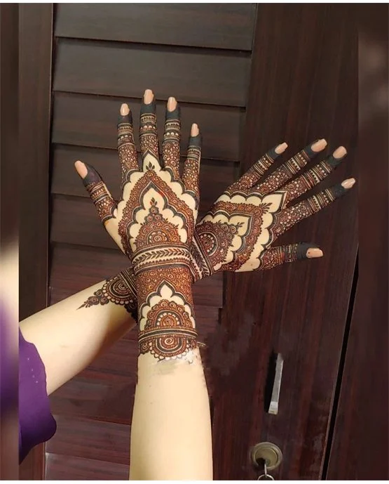 Ornate Pendant And Spiral Featuring Back Hand Mehndi Design Ornate Pendant And Spiral Featuring Back Hand Mehndi Design